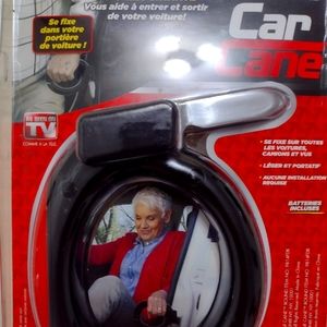 Car Cane with flashlight, seatbelt cutter and glass breaker.